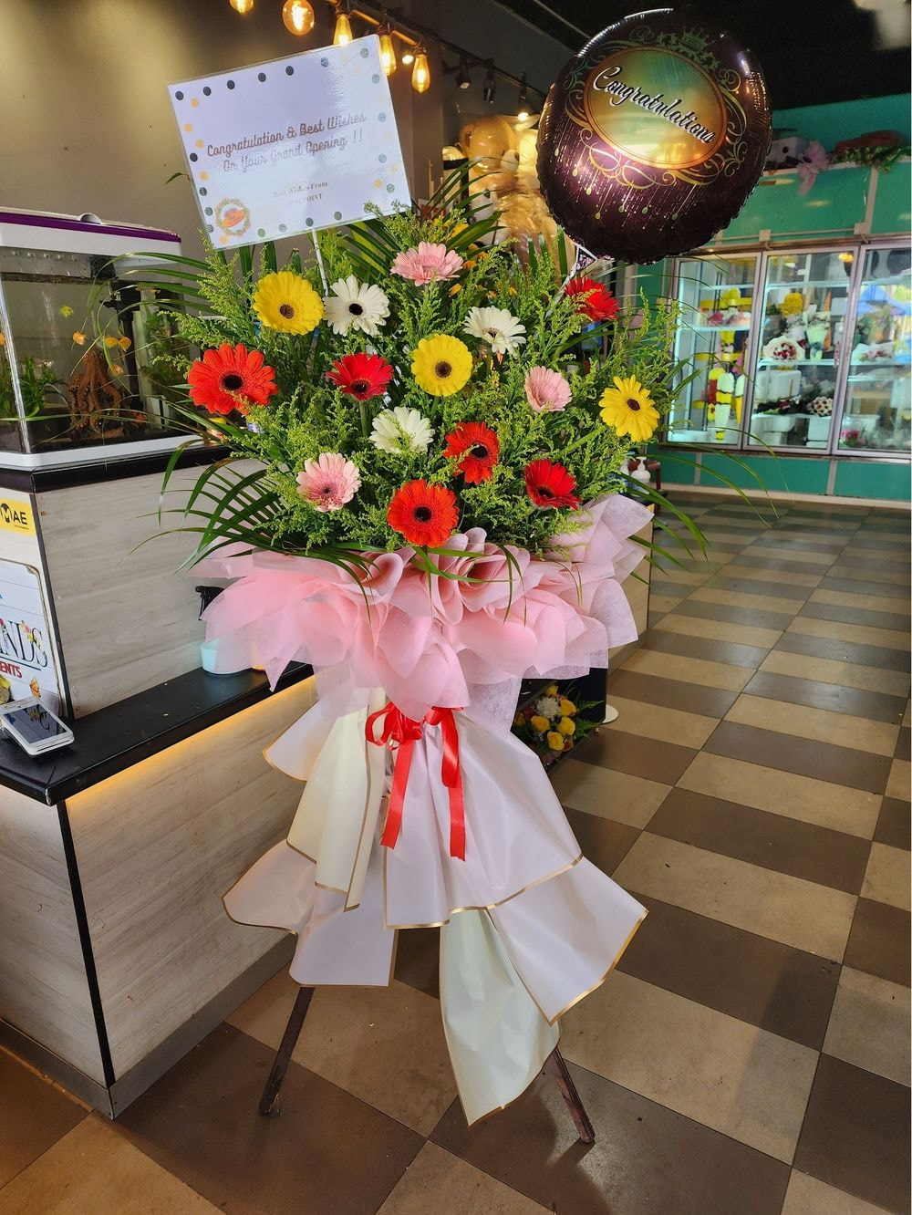 Opening X Stand Arrangement with Foil Balloon