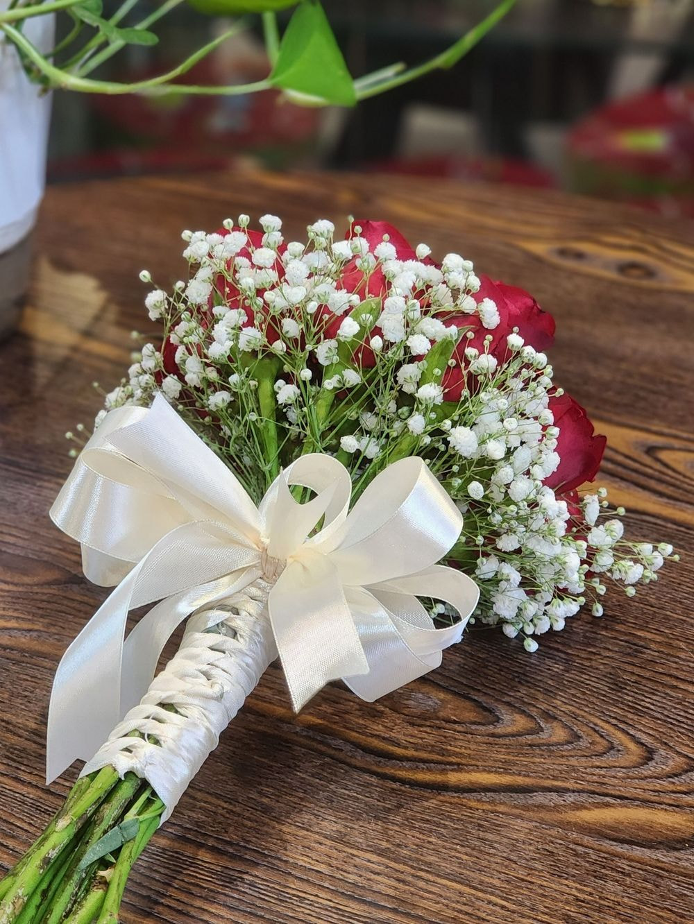 Classic 12 Stalk Red Rose and Baby Breath hand bouquet for bride