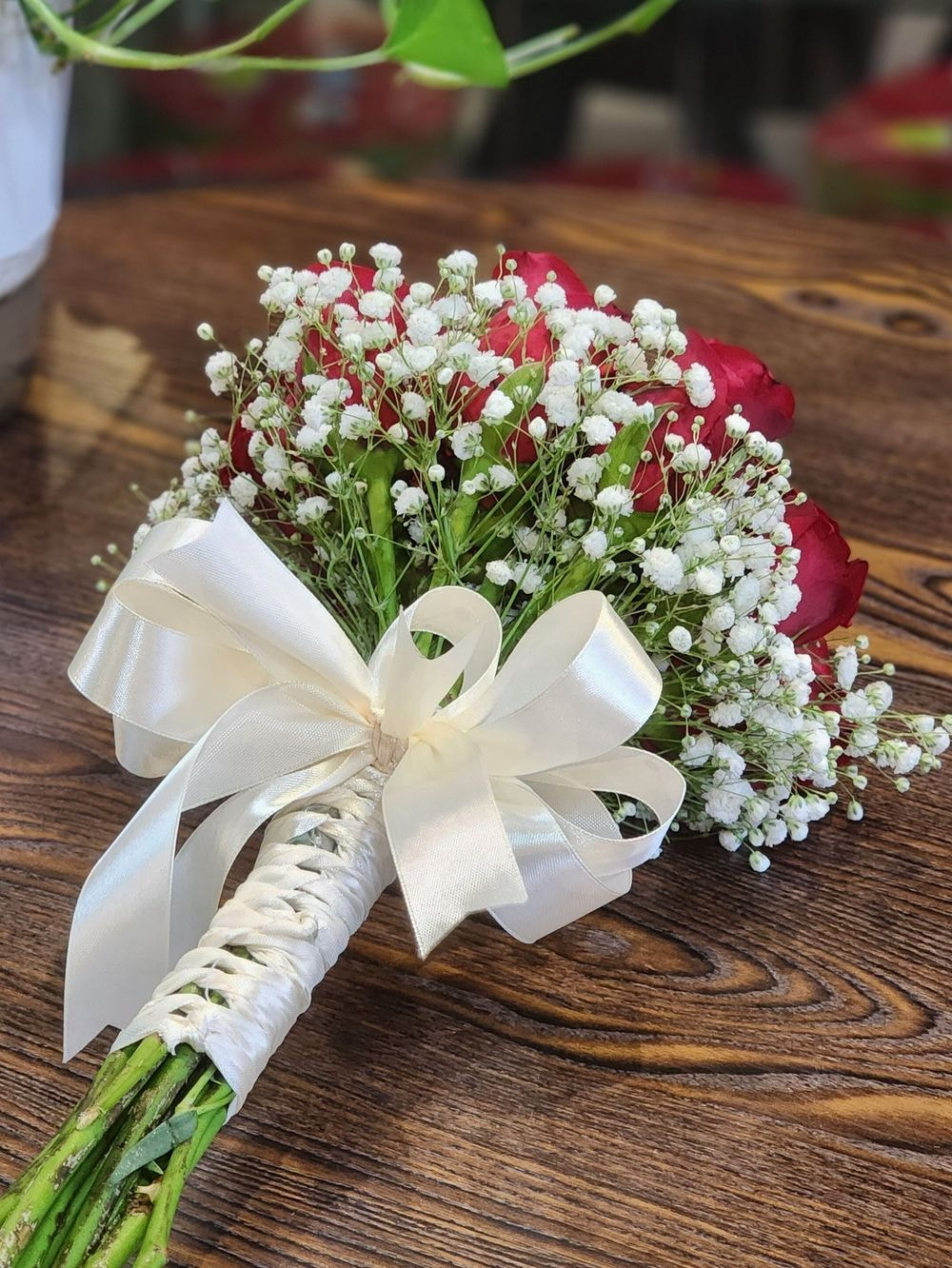 Classic 12 Stalk Red Rose and Baby Breath hand bouquet for bride