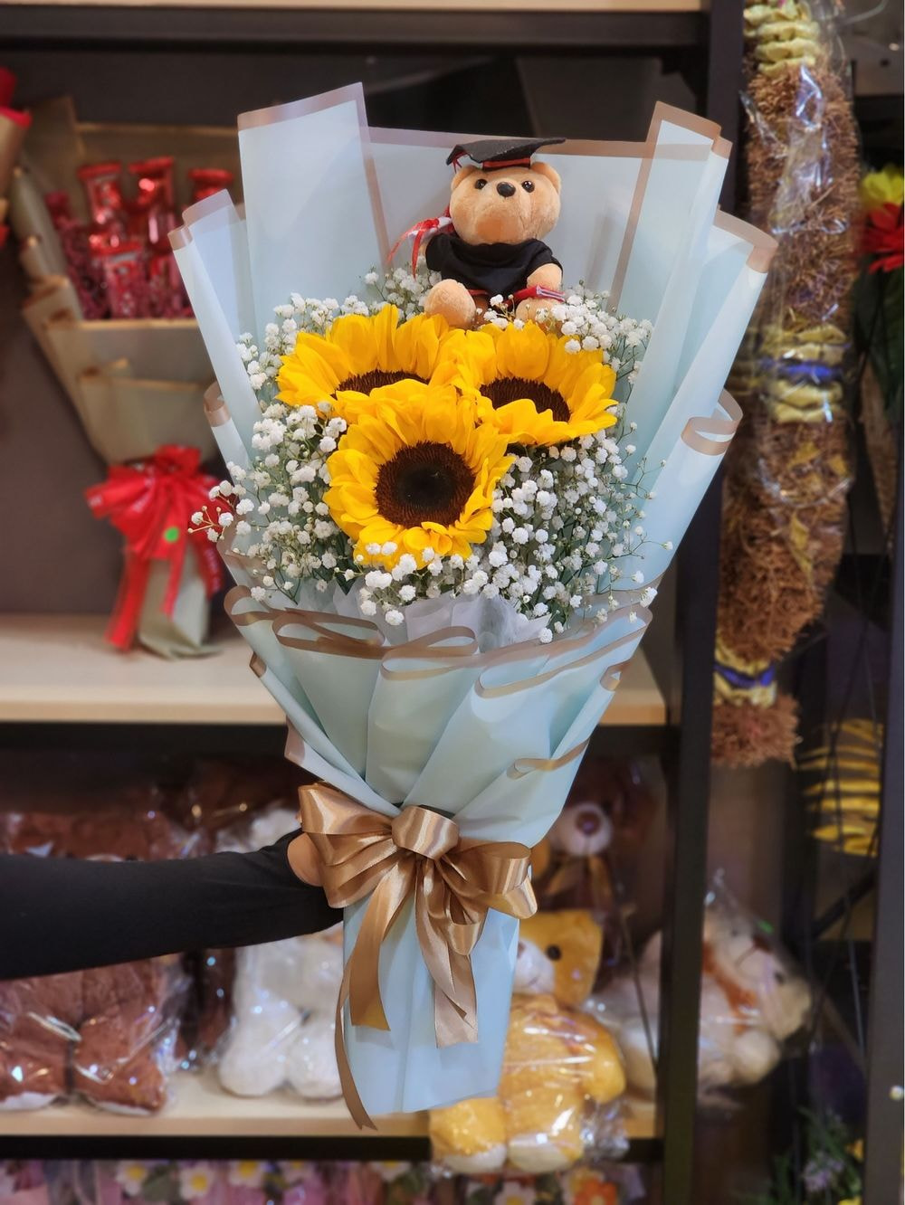 Medium Size : 3 Sunflower Graduation Bouquet + Small Teddy Bear + Baby Breath & Caspia