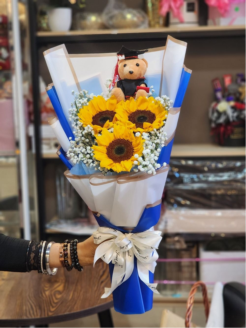 Medium Size : 3 Sunflower Graduation Bouquet + Small Teddy Bear + Baby Breath & Caspia