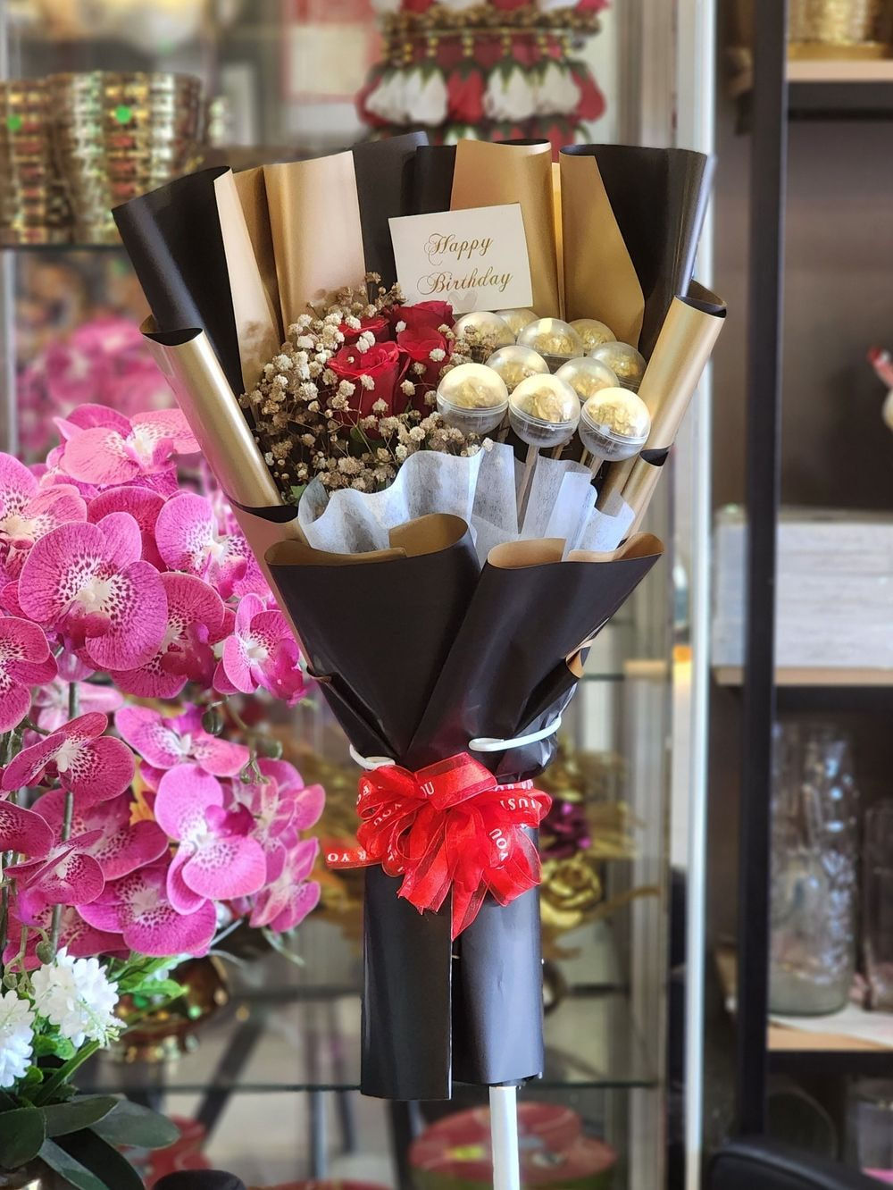 Roses & Ferrero Medium size: 4 rose flower arrangements with 10pcs Ferrero Rocher in cap