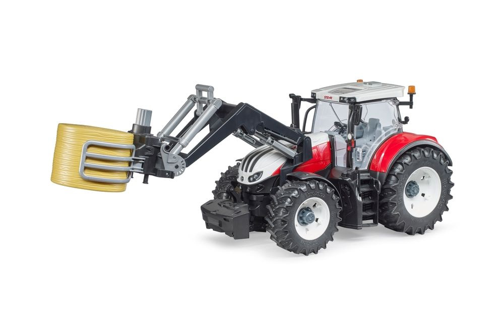 IGRAČA PRIJEMALO ZA BALE Z 1 OKROGLO BALO