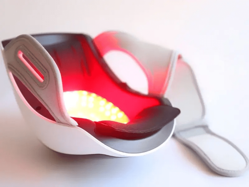 Knee massager with red light therapy