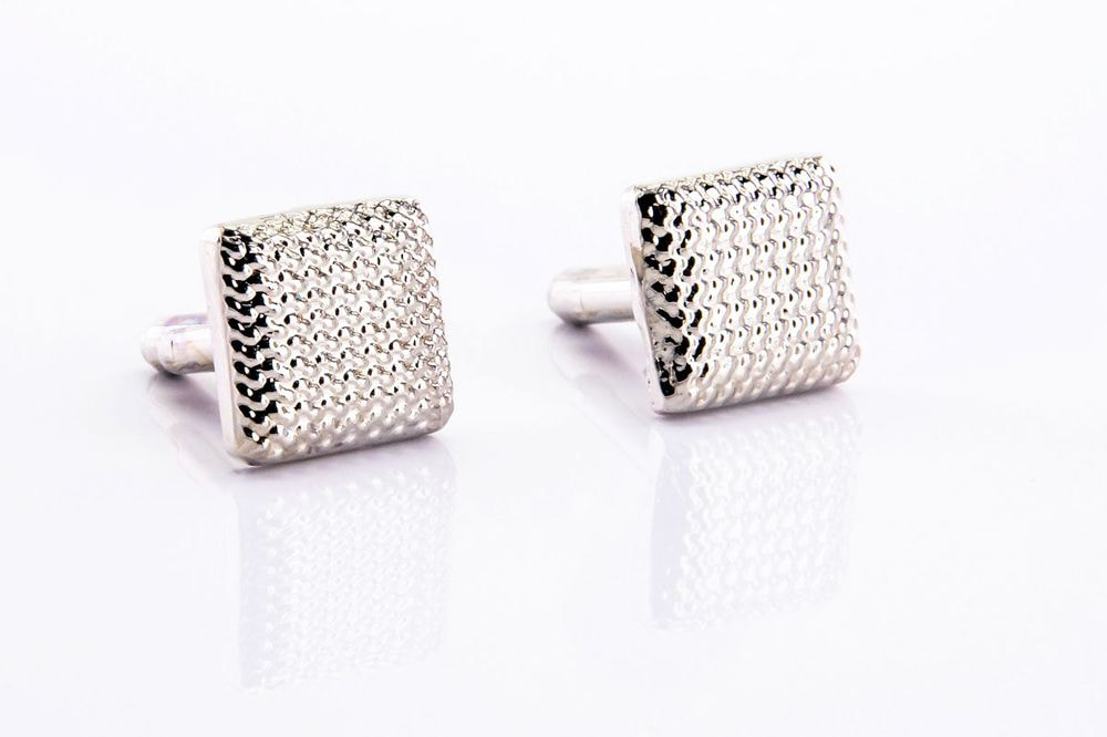 Square silver-colored cufflinks