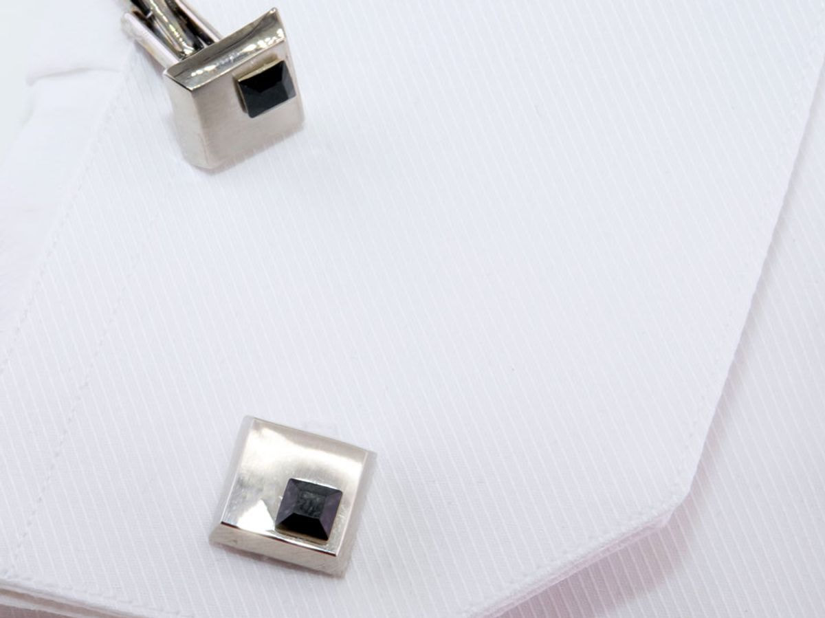 Square steel cufflinks with small black brilliant