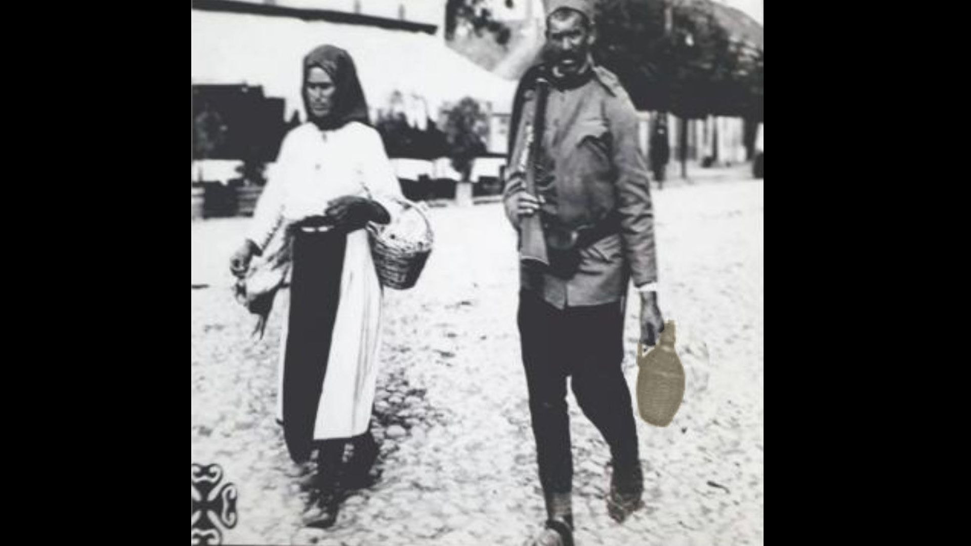 man-and-woman-walking-bottle-rakija